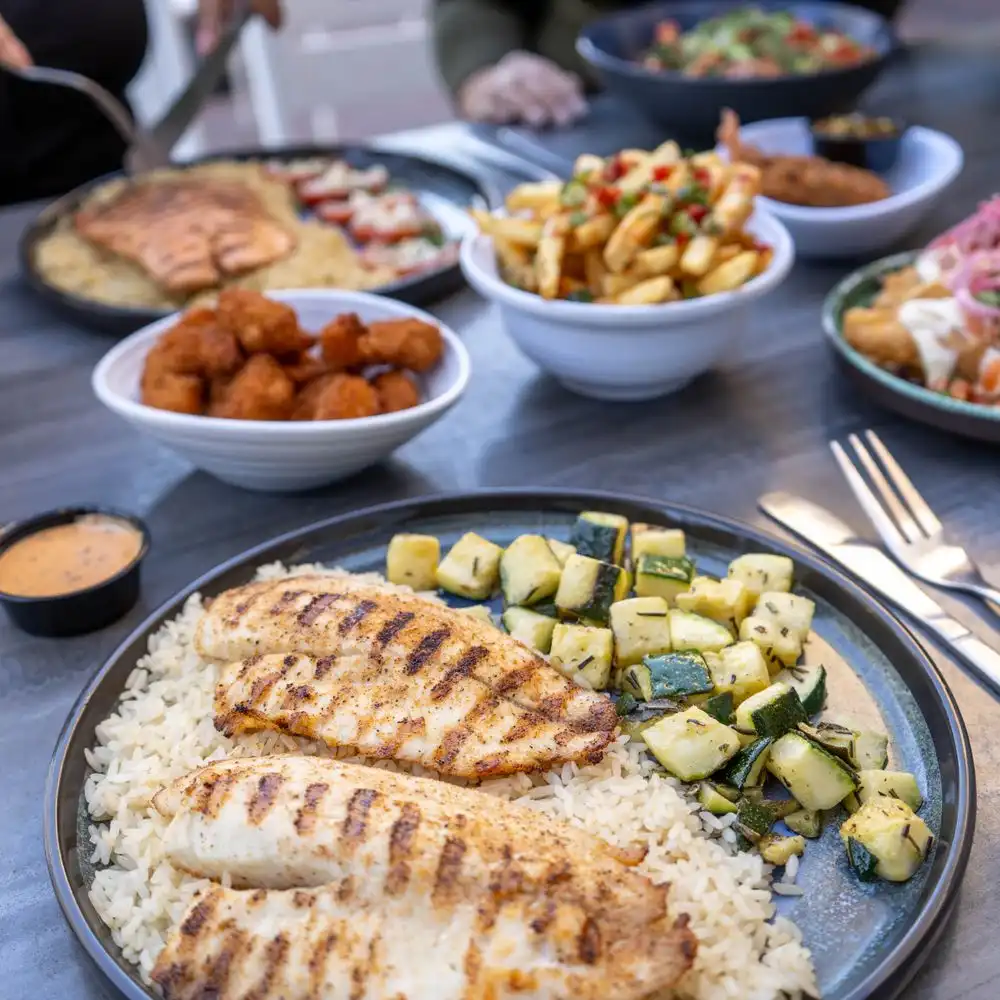 Customer ordering local restaurant food through the TriYum delivery app