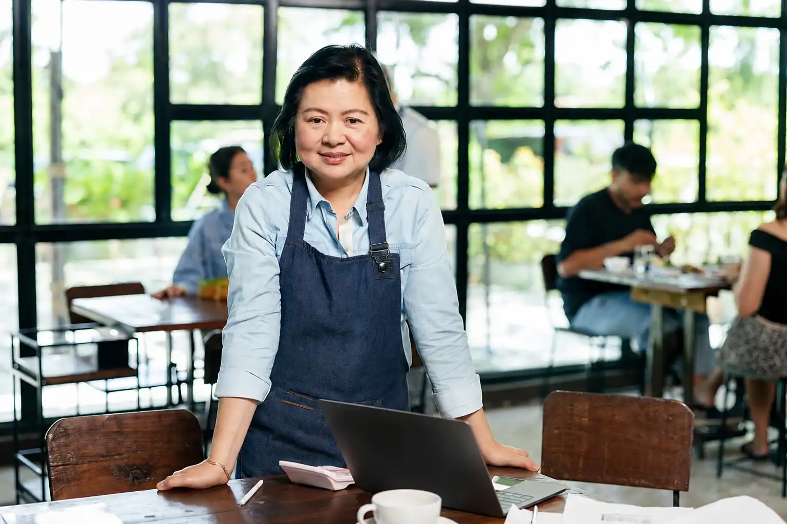 Local restaurant owner partnering with the TriYum food delivery app