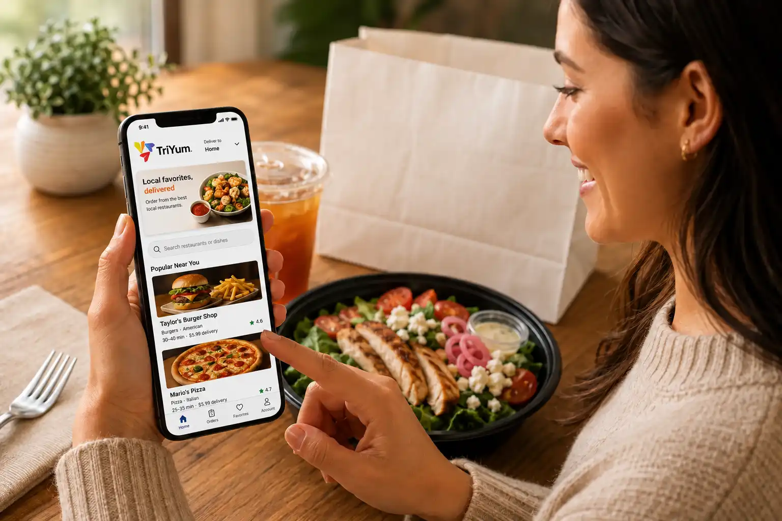 Customer ordering local restaurant food with the Triyum delivery app.